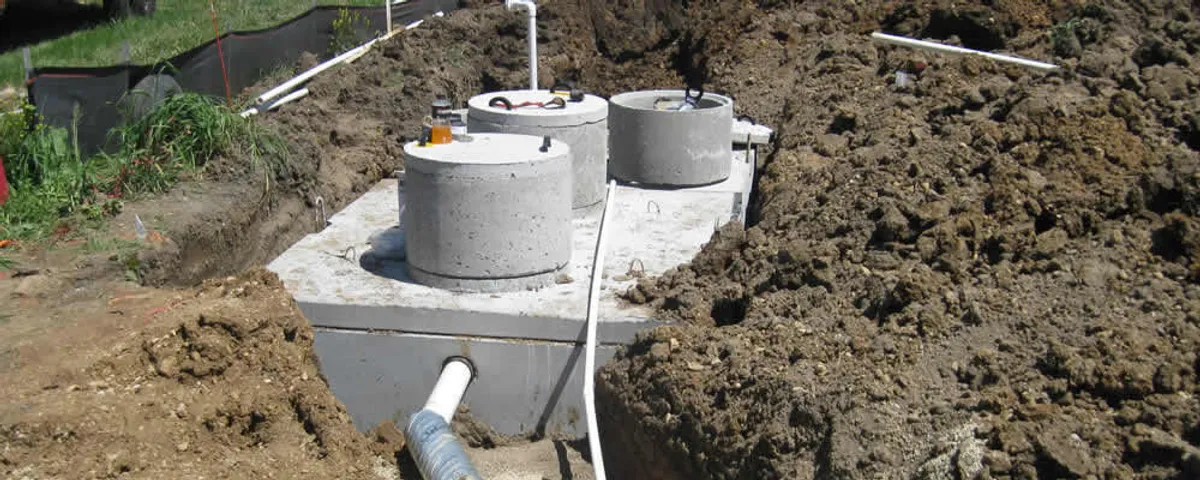 Septic system repair and installation site with tank access ports in Boulder, CO